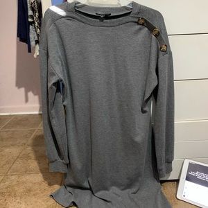 grey long sleeved dress.